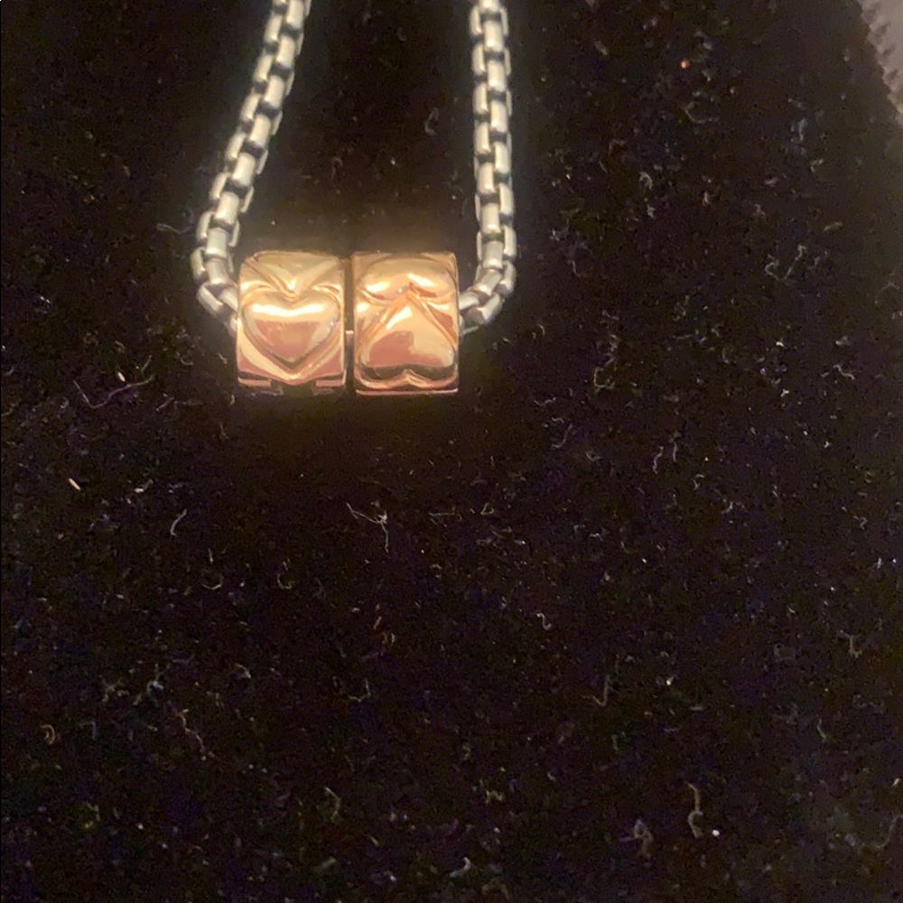 Pair of gold Pandora heart clip on charms